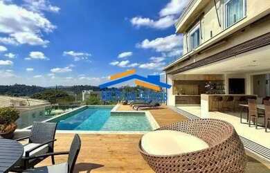 Imagem: A casa em condomínio possui 4 Dormitórios, 5 Banheiros, 4