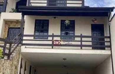 Imagem: A casa possui 3 Dormitórios, 5 Banheiros, 5 Vagas na garagem