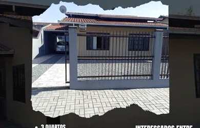 Imagem: A casa possui 3 Dormitórios, 2 Banheiros, 2 Vagas na garagem