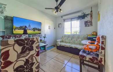 Imagem: O apartamento possui 2 Dormitórios, 1 Banheiro, 1 Vaga na garagem