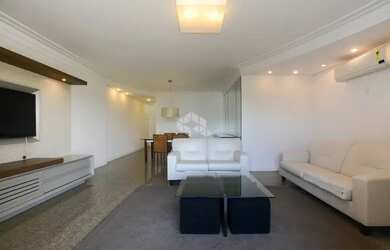 Imagem 2: Apartamento semimobiliado com vista para o mar, 4 dormitórios, sendo 2 suítes, 2 vagas