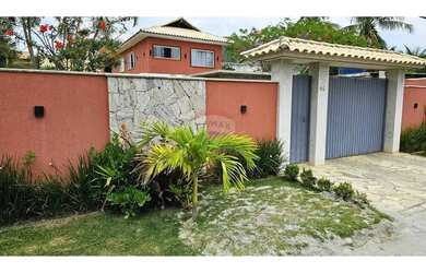 Imagem: A casa possui 5 Dormitórios, 5 Banheiros, 4 Vagas na garagem