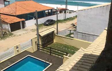 Imagem: A casa possui 4 Dormitórios, 3 Banheiros, 5 Vagas na garagem