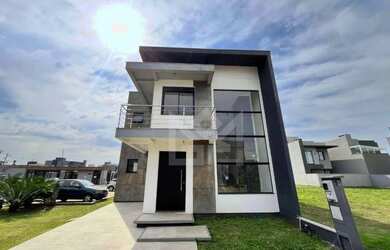 Imagem: A casa em condomínio possui 3 Dormitórios, 3 Banheiros, 1