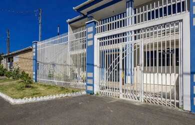 Imagem: A casa possui 4 Dormitórios, 3 Banheiros, 3 Vagas na garagem