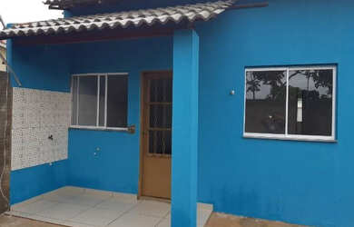 Imagem: A casa possui 3 Dormitórios, 1 Banheiro, 2 Vagas na garagem