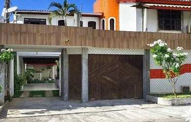 Imagem: A casa possui 3 Dormitórios, 4 Banheiros, 4 Vagas na garagem