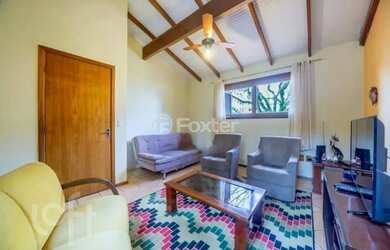 Imagem: A casa possui 3 Dormitórios, 3 Banheiros, 3 Vagas na garagem