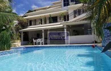 Imagem: A casa em condomínio possui 4 Dormitórios, 5 Banheiros, 2