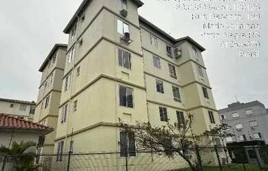 Imagem: O apartamento possui 3 Dormitórios, 1 Banheiro, 1 Vaga na garagem