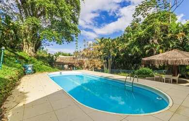 Imagem: A casa em condomínio possui 4 Dormitórios, 5 Banheiros, 4