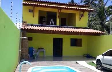 Imagem: A casa possui 3 Dormitórios, 3 Banheiros, 2 Vagas na garagem