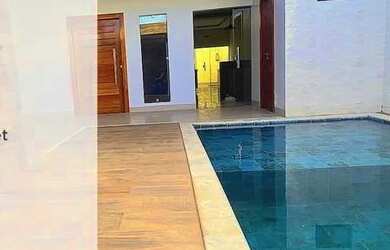 Imagem: A casa possui 4 Dormitórios, 4 Banheiros, 2 Vagas na garagem