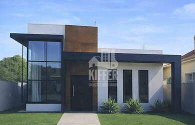 Imagem: A casa possui 3 Dormitórios, 2 Banheiros, 2 Vagas na garagem