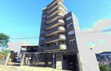 Imagem: O apartamento possui 3 Dormitórios, 1 Banheiro, 2 Vagas na