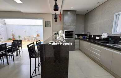 Imagem: A casa possui 4 Dormitórios, 1 Banheiro, 5 Vagas na garagem