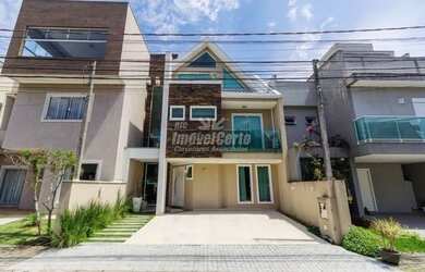 Imagem: A casa possui 4 Dormitórios, 4 Banheiros, 2 Vagas na garagem