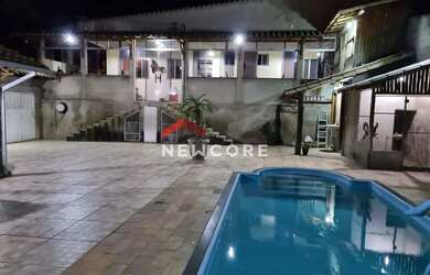 Imagem: A casa possui 3 Dormitórios, 3 Banheiros, 2 Vagas na garagem