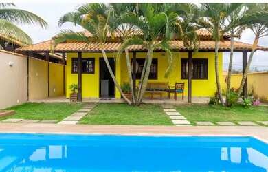 Imagem: A casa possui 3 Dormitórios, 3 Banheiros, 3 Vagas na garagem