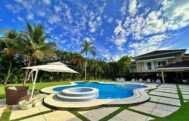 Imagem 1: Linda mansão de canal em cond. de luxo com aeroporto e praia, 6 suítes