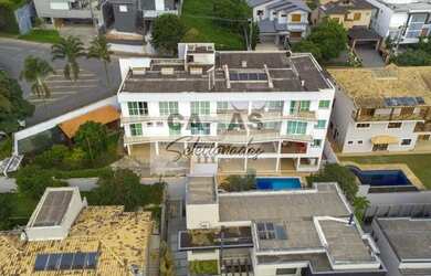 Imagem: A casa em condomínio possui 5 Dormitórios, 5 Banheiros, 5