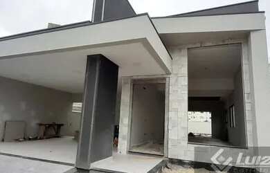 Imagem: A casa possui 3 Dormitórios, 3 Banheiros, 2 Vagas na garagem