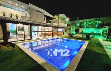 Imagem: A casa possui 5 Dormitórios, 5 Banheiros, 5 Vagas na garagem