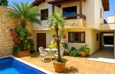 Imagem: A casa possui 4 Dormitórios, 5 Banheiros, 5 Vagas na garagem