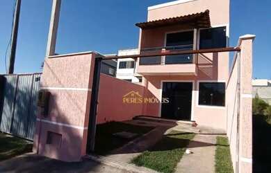 Imagem: A casa possui 2 Dormitórios, 3 Banheiros, 1 Vaga na garagem