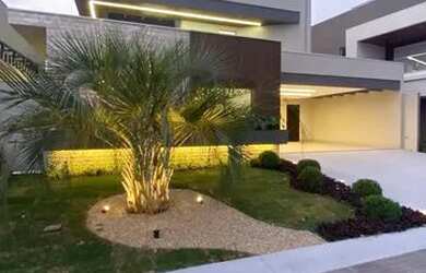 Imagem: A casa em condomínio possui 4 Dormitórios, 5 Banheiros, 328m²