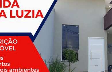 Imagem: A casa possui 3 Dormitórios, 2 Banheiros, 2 Vagas na garagem