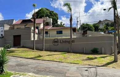 Imagem: A casa possui 3 Dormitórios, 5 Banheiros, 5 Vagas na garagem