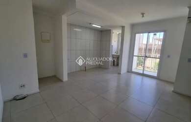 Imagem: O apartamento possui 2 Dormitórios, 1 Banheiro, 2 Vagas na