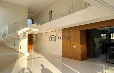 Imagem: A casa em condomínio possui 4 Dormitórios, 5 Banheiros, 4