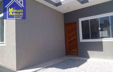 Imagem: A casa possui 3 Dormitórios, 2 Banheiros, 1 Vaga na garagem