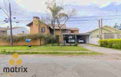 Imagem: A casa possui 5 Dormitórios, 5 Banheiros, 5 Vagas na garagem