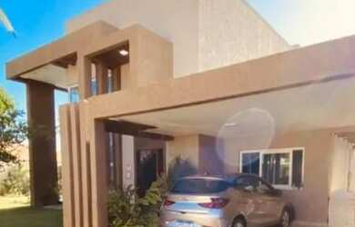 Imagem: A casa possui 5 Dormitórios, 5 Banheiros, 4 Vagas na garagem