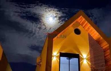 Imagem: A casa possui 2 Dormitórios, 3 Banheiros, 3 Vagas na garagem