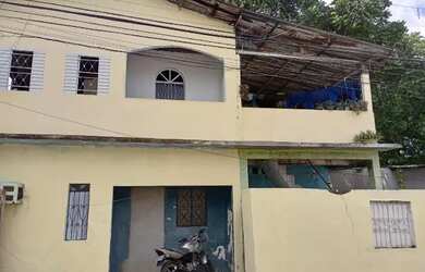 Imagem: A casa possui 5 Dormitórios, 4 Banheiros, 1 Vaga na garagem