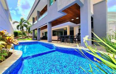 Imagem: A casa possui 5 Dormitórios, 5 Banheiros, 2 Vagas na garagem