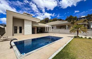 Imagem: A casa em condomínio possui 3 Dormitórios, 3 Banheiros, 5