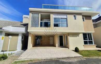 Imagem: A casa possui 4 Dormitórios, 5 Banheiros, 354m² de Área e