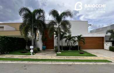 Imagem: A casa possui 4 Dormitórios, 5 Banheiros, 4 Vagas na garagem