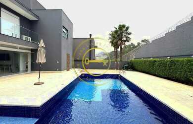 Imagem: A casa em condomínio possui 4 Dormitórios, 5 Banheiros, 5