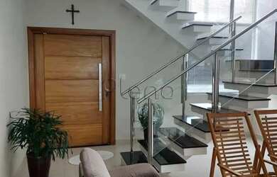 Imagem: A casa possui 3 Dormitórios, 4 Banheiros, 4 Vagas na garagem