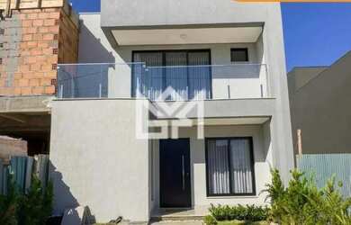 Imagem: A casa possui 3 Dormitórios, 3 Banheiros, 2 Vagas na garagem