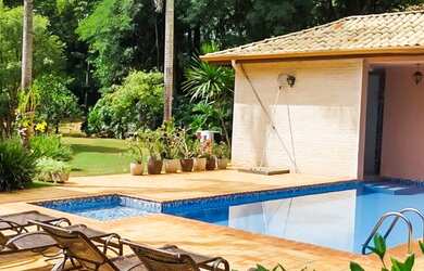 Imagem: A casa em condomínio à venda possui 5 Dormitórios, 5 Banheiros