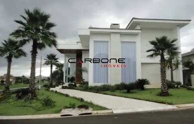 Imagem: A casa em condomínio possui 4 Dormitórios, 5 Banheiros, 1.000m²