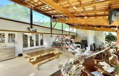 Imagem: A casa possui 3 Dormitórios, 5 Banheiros, 5 Vagas na garagem