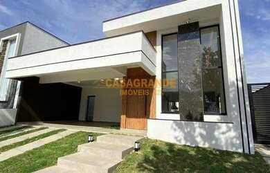 Imagem: A casa possui 3 Dormitórios, 3 Banheiros, 4 Vagas na garagem